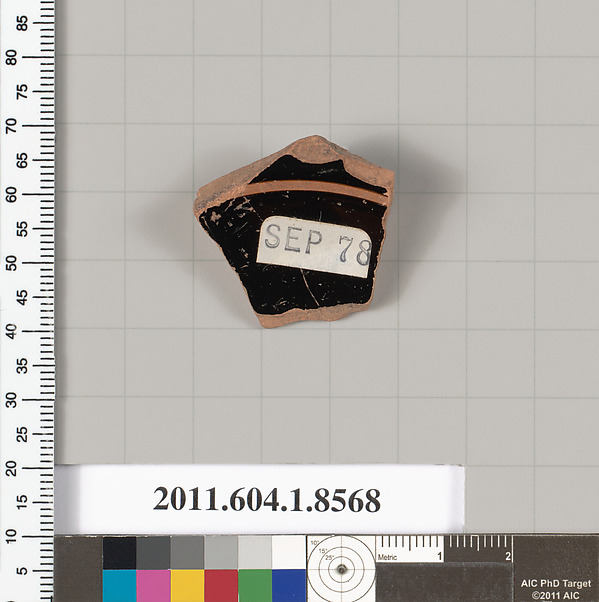 Terracotta fragment of a stemless kylix (drinking cup)