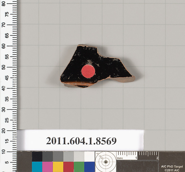 Terracotta fragment of a stemless kylix (drinking cup)