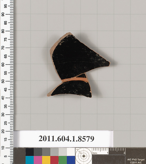 Terracotta fragment of a stemless kylix (drinking cup)