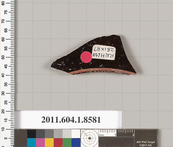 Terracotta fragment of a stemless kylix (drinking cup)