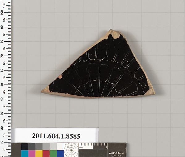 Terracotta fragment of a stemless kylix (drinking cup)