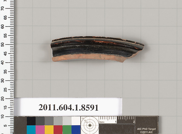 Terracotta fragment of a stemless kylix (drinking cup)