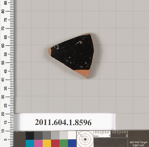 Terracotta fragment of a stemless kylix (drinking cup)