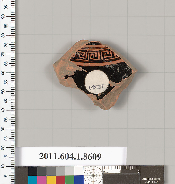 Terracotta fragment of a stemless kylix (drinking cup)