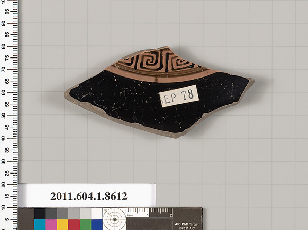 Terracotta fragment of a stemless kylix (drinking cup)