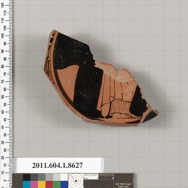 Terracotta fragment of a stemless kylix (drinking cup)