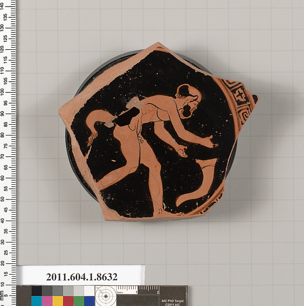 Terracotta fragment of a stemless kylix (drinking cup)