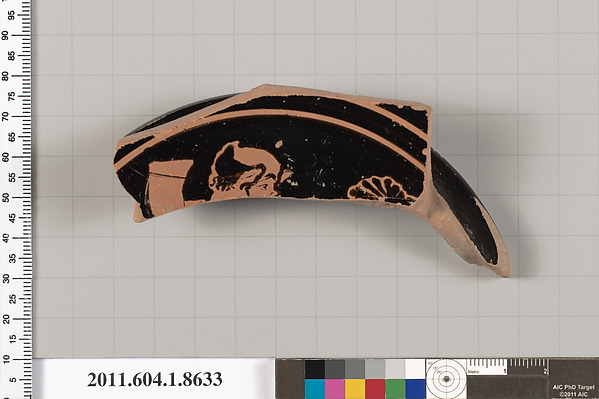 Terracotta fragment of a stemless kylix (drinking cup)