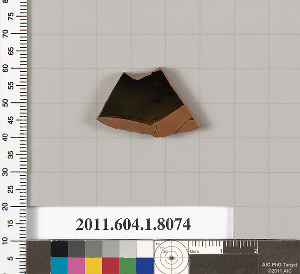 Terracotta fragment of a kylix (drinking cup)