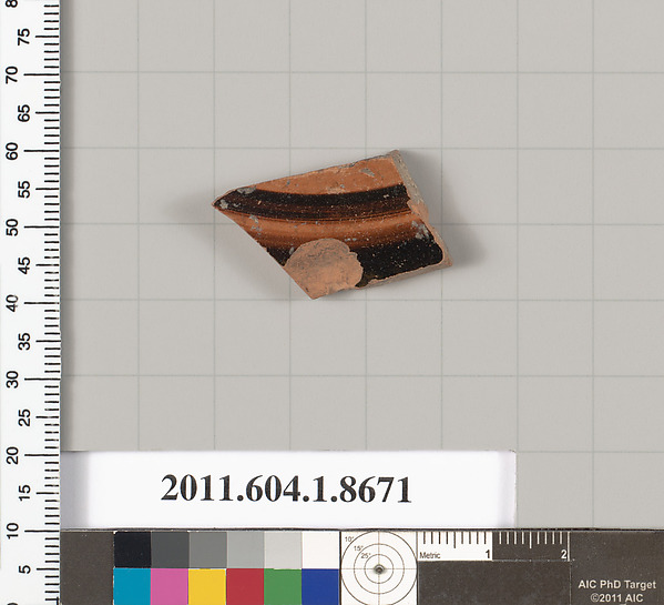 Terracotta fragment of a stemless kylix (drinking cup)