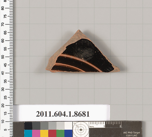 Terracotta fragment of a stemless kylix (drinking cup)