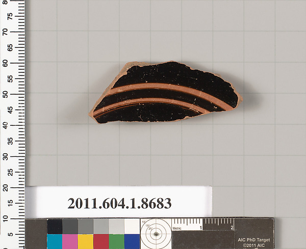 Terracotta fragment of a stemless kylix (drinking cup)
