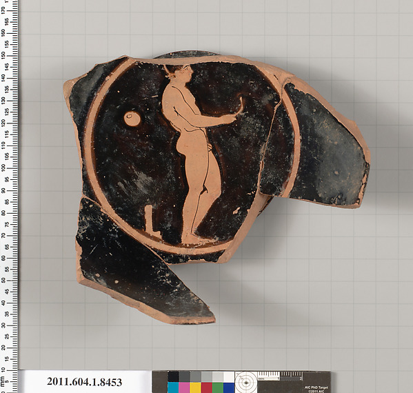 Terracotta fragment of a stemless kylix (drinking cup)
