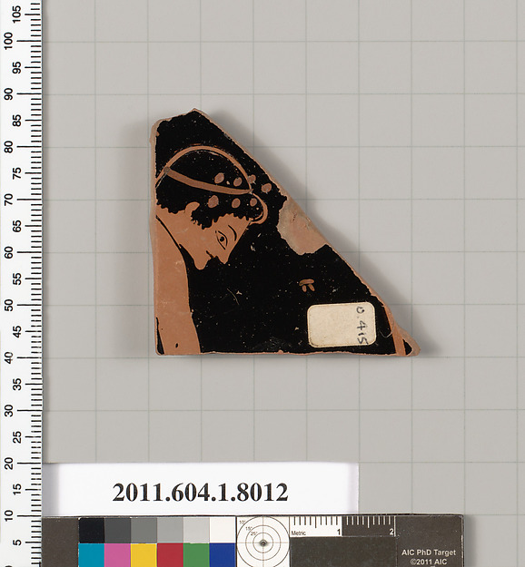 Terracotta fragment of a kylix (drinking cup)