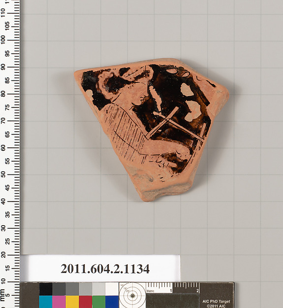Terracotta fragment of a lekanis lid (covered dish)