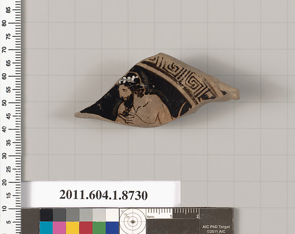 Terracotta fragment of a stemless cup