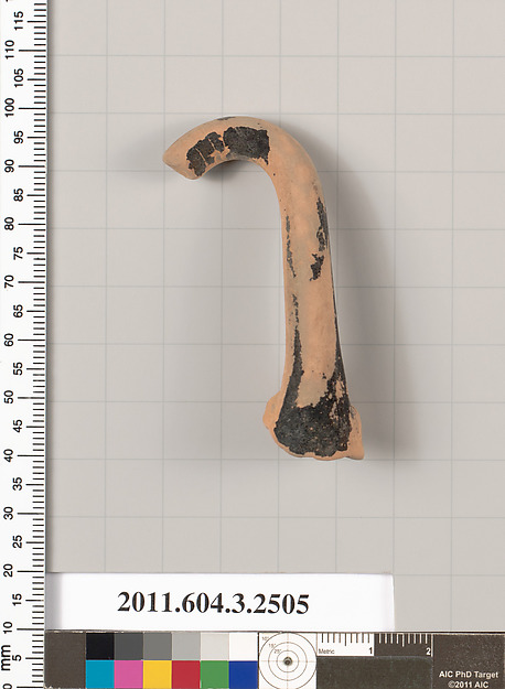 Terracotta fragment of a kylix (drinking cup)