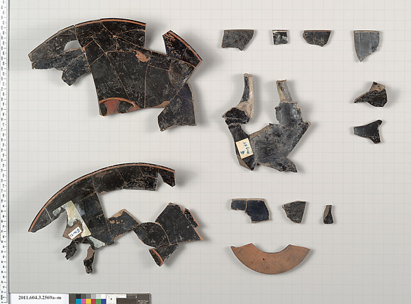 Terracotta fragments of a kylix: eye-cup (drinking cup)