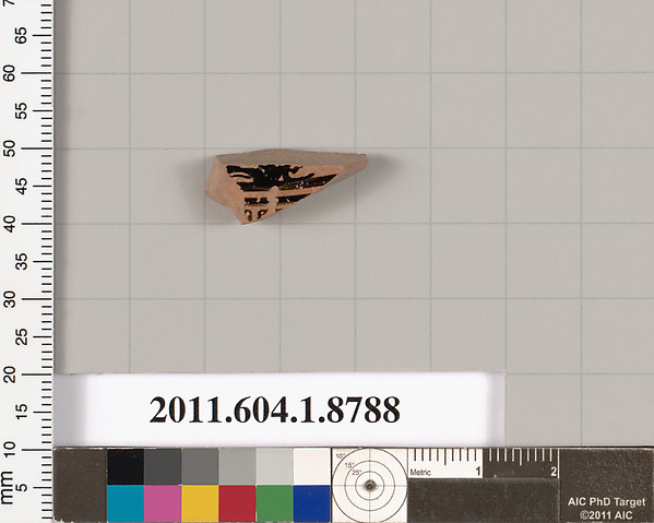 Terracotta fragment of a kylix (drinking cup)
