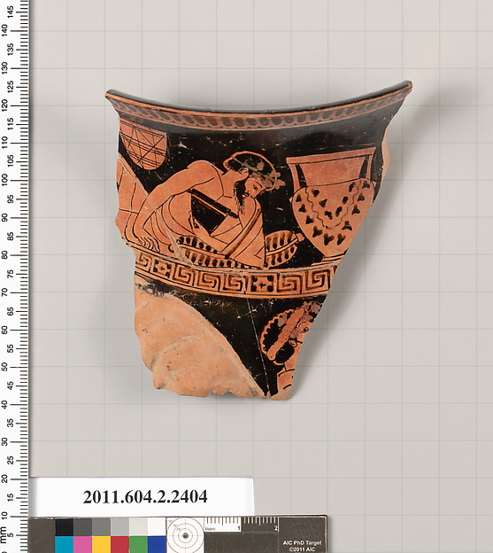 Terracotta fragment of a rhyton in shape of a ram's head (vase for libations or drinking)