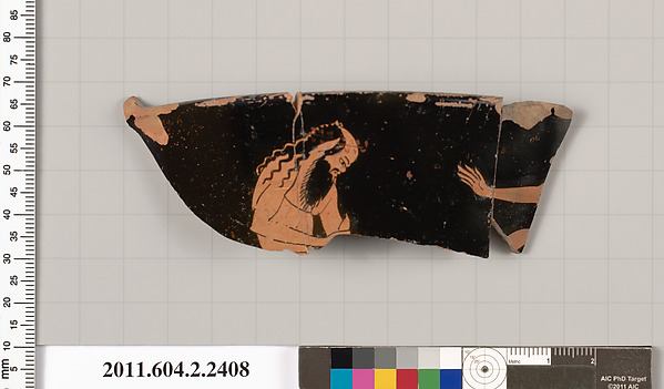 Terracotta fragment of a head kantharos (drinking cup with high handles)?