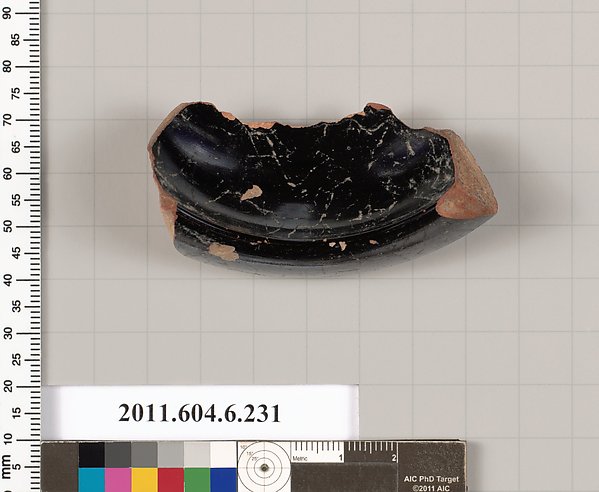 Terracotta fragment of a salt cellar?