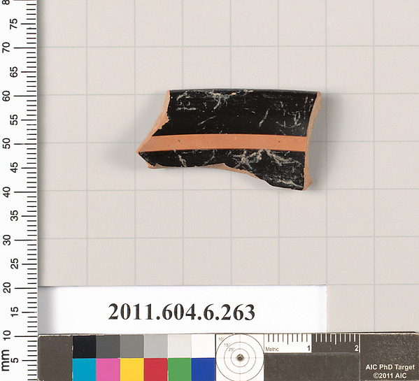 Terracotta rim fragment of an open shape