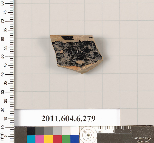Terracotta rim fragment of an open shape
