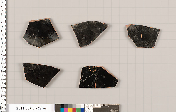 Terracotta fragments of kylikes (drinking cups)