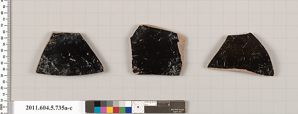 Terracotta fragments of kylikes (drinking cups)