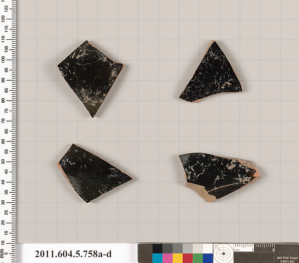 Terracotta fragments of kylikes (drinking cups)