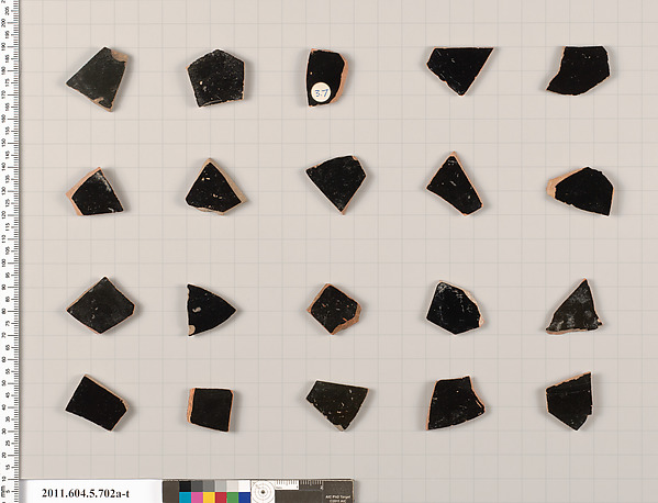 Terracotta fragments of kylikes (drinking cups)
