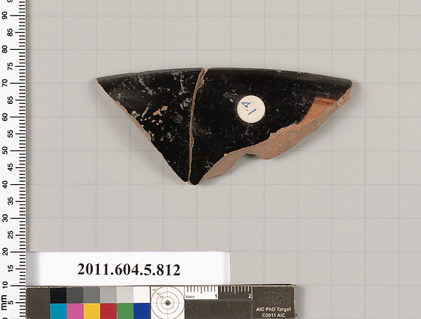 Terracotta rim fragment of a kylix (drinking cup)