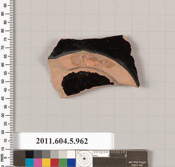 Terracotta fragment of a stemless kylix (drinking cup)