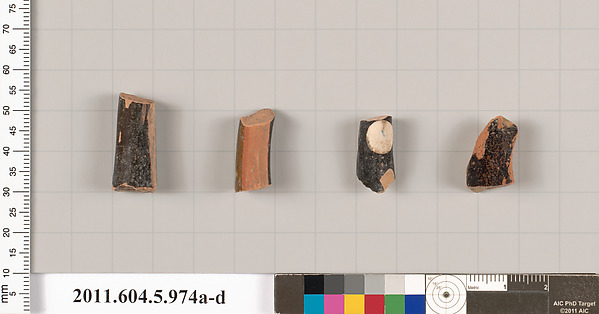 Terracotta fragments of kylikes (drinking cups)