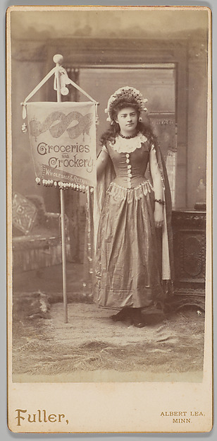 [Merchants' Carnival Portrait: Johnson, Nelson & Nelson Groceries and Crockery Wholesale & Retail, Albert Lea, Minnesota