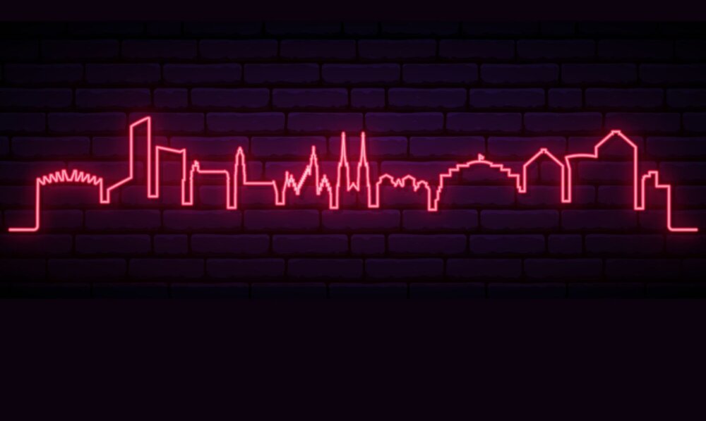 Zdjęcie okładkowe wpisu Jolanta PAWNIK: Miasto, które świeciło kolorami. Wrocław i historia jego neonów